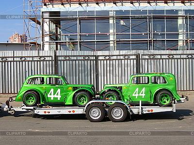  Race Cars on Two Green Racing Cars At The Trailer      Tomatto