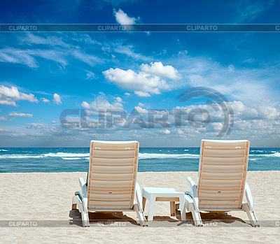  Chairs on Two Sun Beach Chairs On Shore Near Ocean   High Resolution Stock