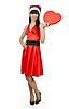 Mädchen im roten Kleid, Hut von Santa | Stock Foto