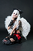 Girl in angel wing | Foto de stock