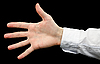 Mano con la manga en blanco sobre negro | Foto de stock