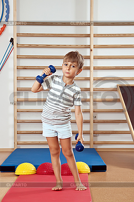 Boy with dumbbell in the gym | High resolution stock photo |ID 3063274