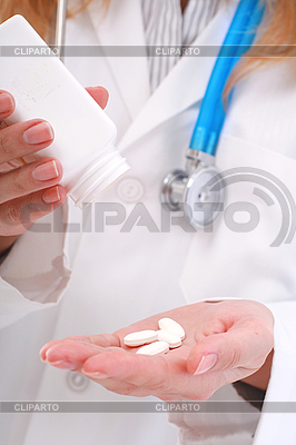 Giving pills. | High resolution stock photo |ID 3108370