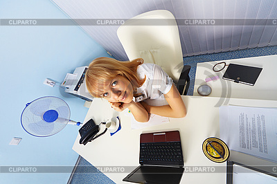 Funny young woman sitting in an office | High resolution stock photo |ID 3145742