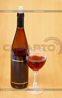 Botella de vino rojo y vidrio sobre mesa de madera | Foto de alta resolución |ID 3149711