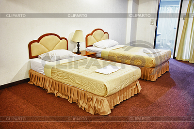 Two beds in interior of hotel | High resolution stock photo |ID 3288446