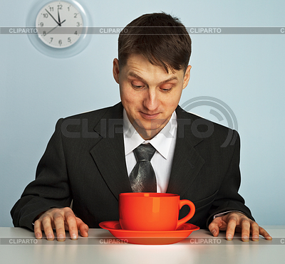 Businessman drinking very strong and hot coffee | High resolution stock photo |ID 3320597