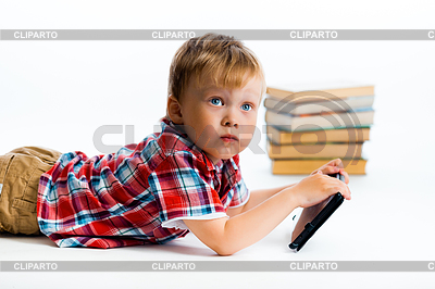 Niño pequeño con la computadora y libros de la tableta | Foto de alta resolución |ID 5148528