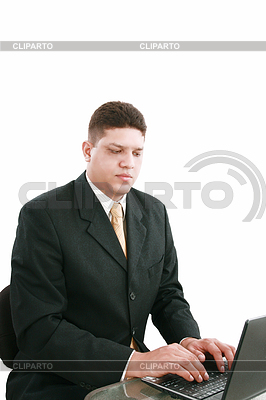 Hombre de negocios en la computadora portátil en una oficina | Foto de alta resolución |ID 3357570