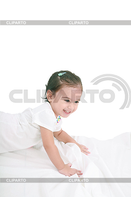 Cute little girl on bed at home | High resolution stock photo |ID 3358359