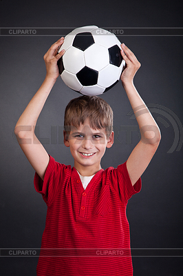 Niño lindo está sosteniendo pelota de fútbol. Balón de fútbol | Foto de alta resolución |ID 3383865